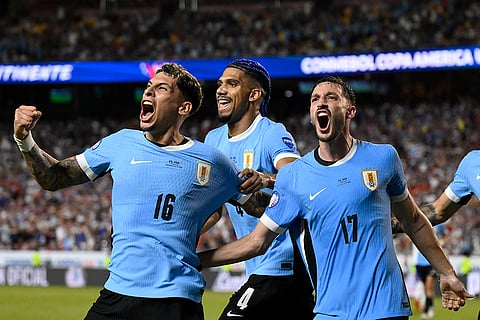Uruguay's Mathias Olivera celebrates after scoring a goal